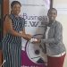 Vivian Kai Lokko presenting 'Ghana chocolate' to Winifred Ngangure, head of Investment Promotion