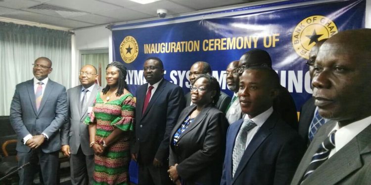 some members of the council with some officials from the Bank of Ghana
