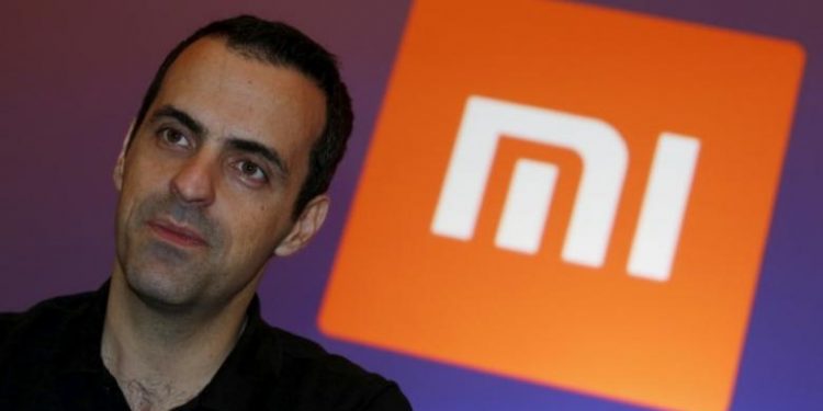 Xiaomi's Vice President Hugo Barra looks on in front of the company's logo during a group interview after the launching ceremony of Redmi Note 3 in Hong Kong, China March 21, 2016.      REUTERS/Bobby Yip - RTSBEFO
